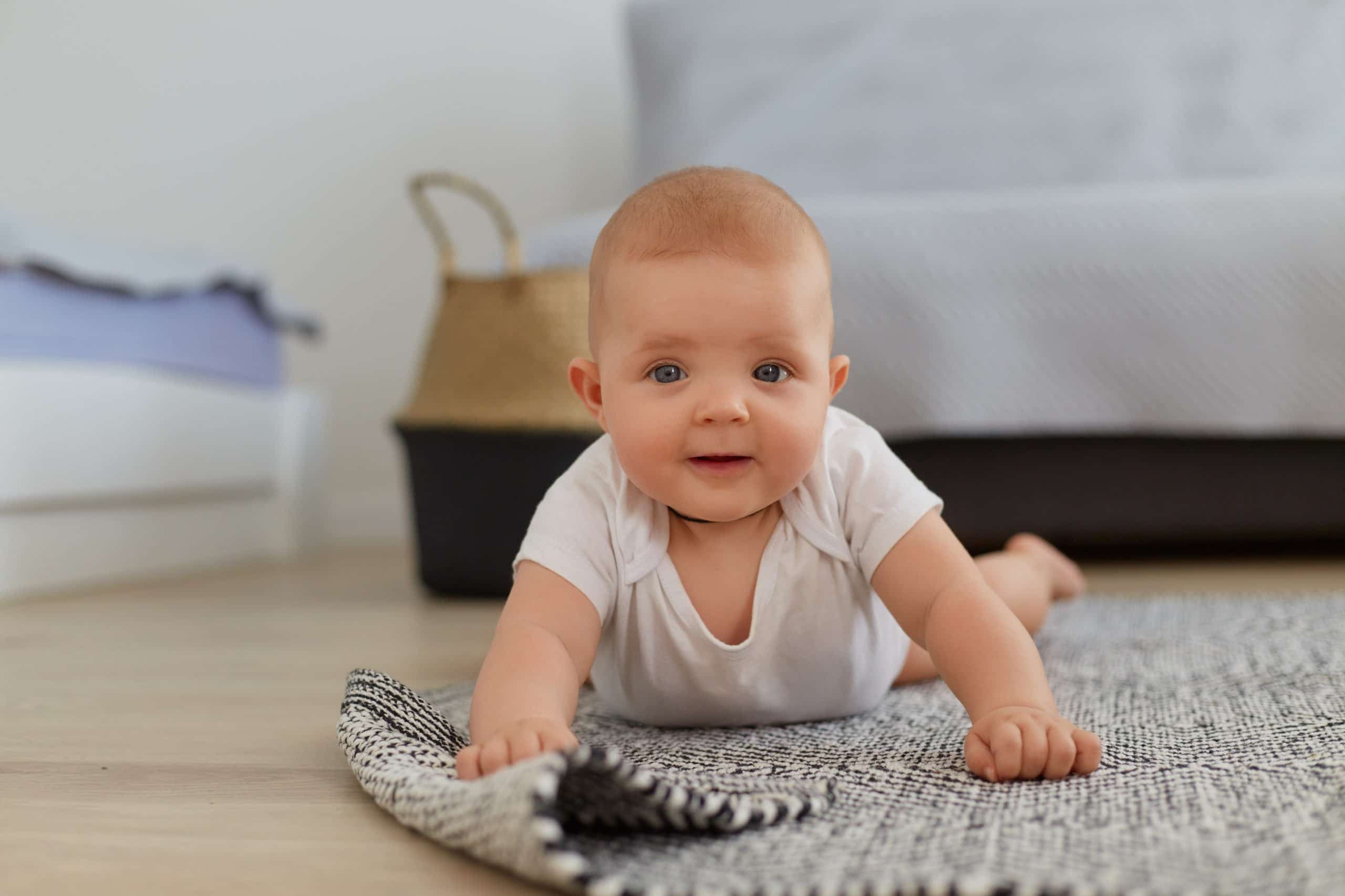 Baby crawling exercises, stages and video download. A Parents Complete Guide to baby crawling.