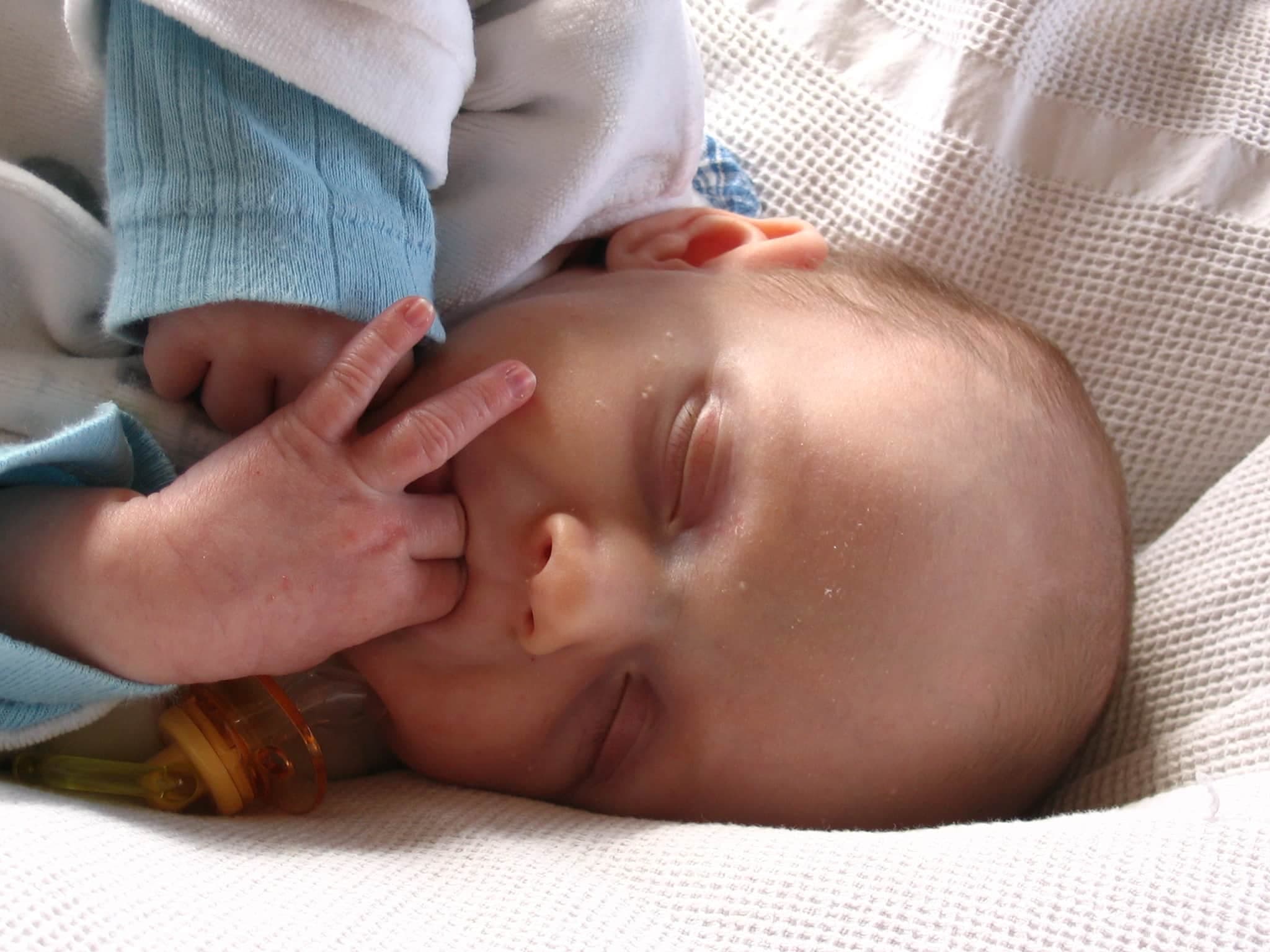 From Teething to Obsessions: Baby Hands Mouth, Solutions to Common Infant Behavior Issues